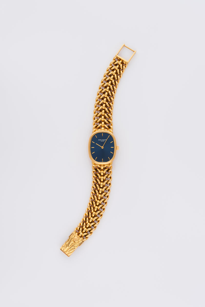 1970s Patek Philippe Lady Ellipse 18k Yellow Gold Blue Dial 4826/19