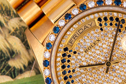 1986 Rolex Oyster Perpetual Day-Date Pavé diamonds and sapphire strings 18148